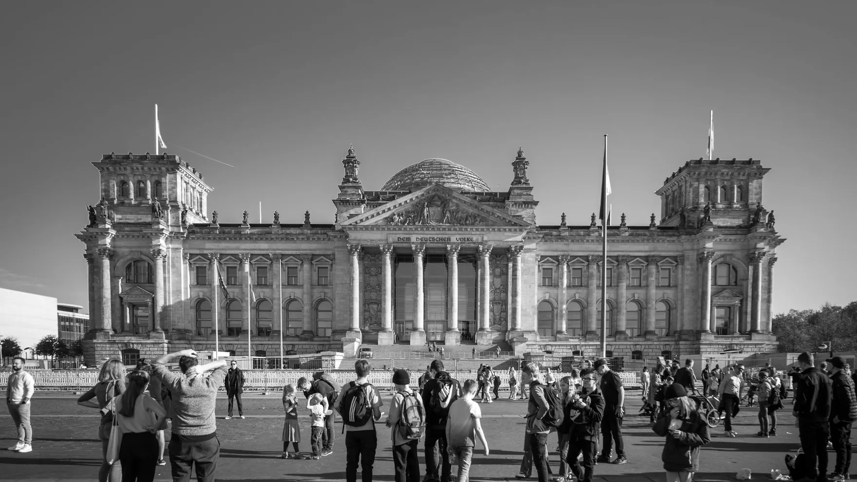 People in front of the Reichstag building in Berlin, black and white